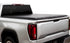 Midwest Aftermarket truck bed cover for Chevy/GMC with bold graphics and tagline 'Upgrade Your Ride'.