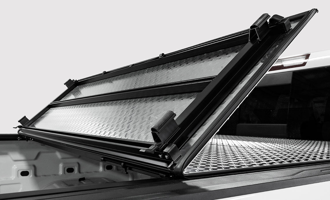 Midwest Aftermarket - Upgrade Your Ride with LOMAX Tonneau Cover for Chevy/GMC Trucks