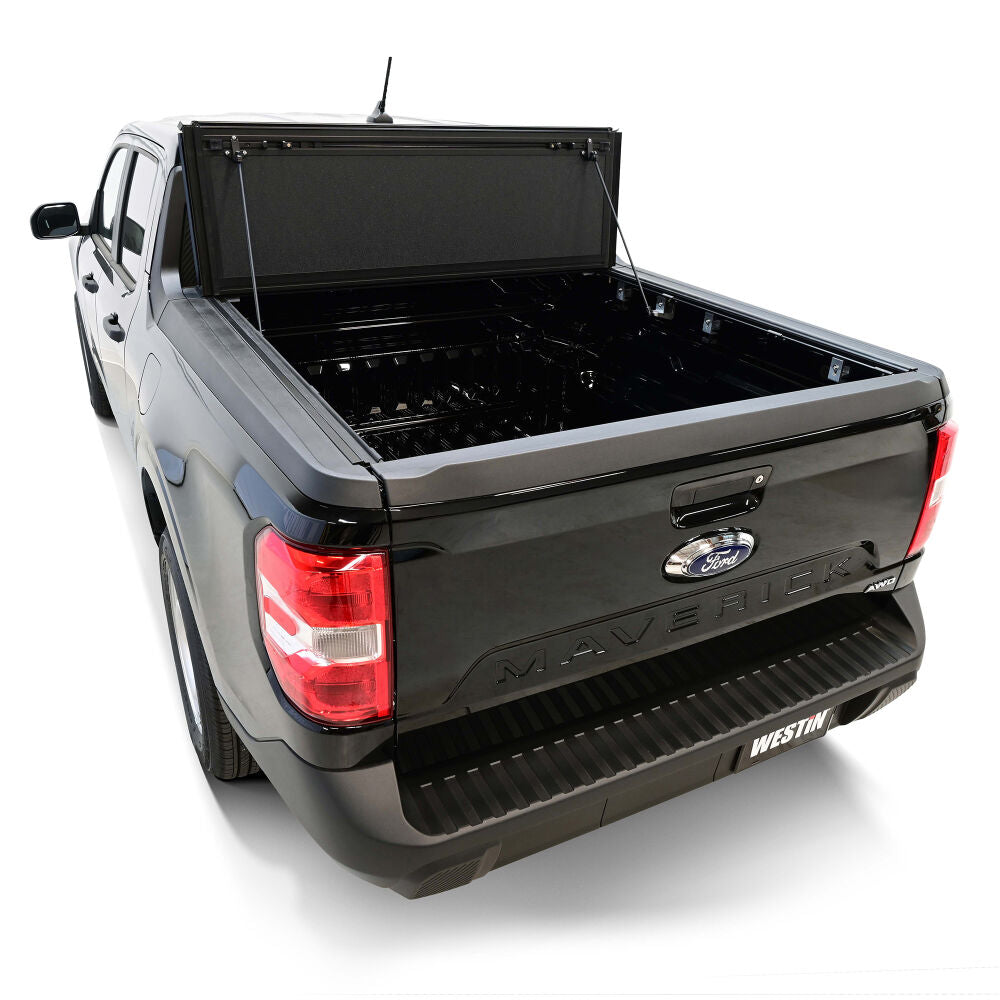 Westin Hard Tri-Fold Tonneau Cover on a pickup truck, featuring rugged design and secure fit.