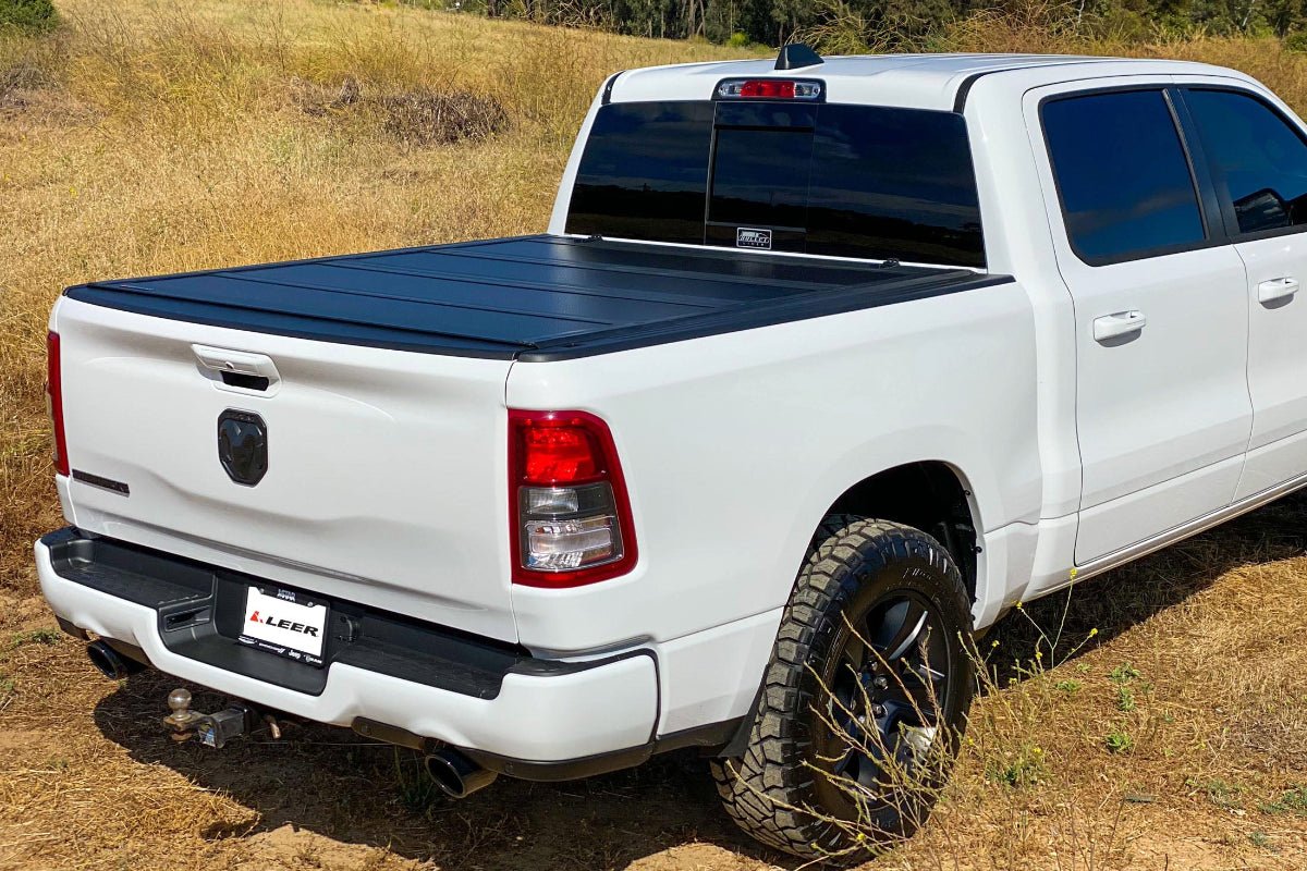 LEER GroupLeer HF650M Hard Quad - Folding Tonneau Cover | For 2014 - 2018 GMC Sierra 1500 Chevy Silverado 1500 | 5ft 8in Beds