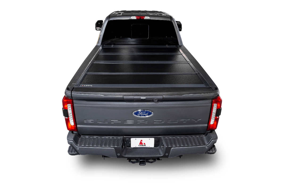 LEER GroupLeer HF650M Hard Quad - Folding Tonneau Cover | For 09 - 19 Ram 1500 1500 Classic 09 - 23 Ram 2500 3500 | 6ft 4in Beds