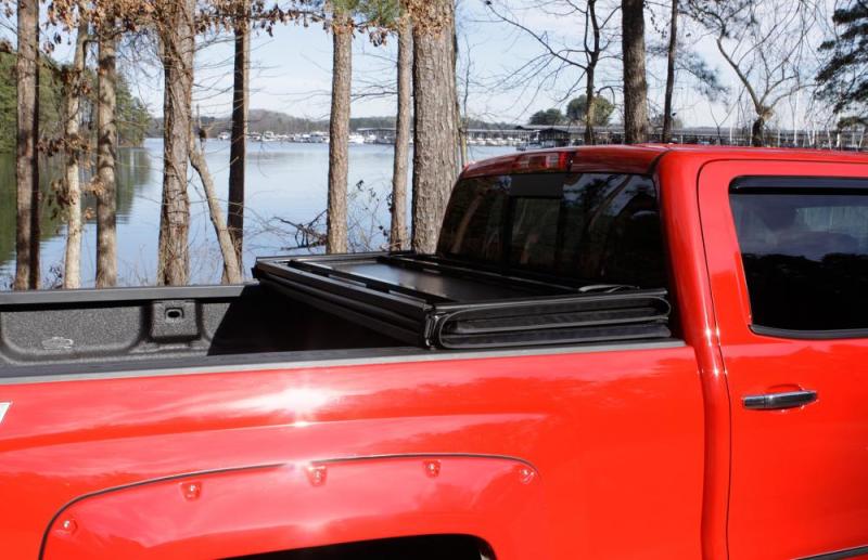 LUNDLund 88 - 99 Chevy C1500 Fleetside (6.6ft. Bed) Hard Fold Tonneau Cover - Black