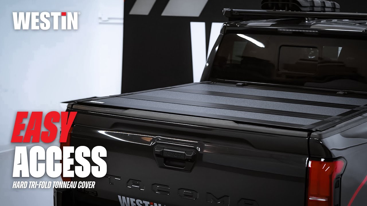 Westin Hard Tri-Fold Tonneau Cover on a pickup truck, featuring rugged design and secure fit.